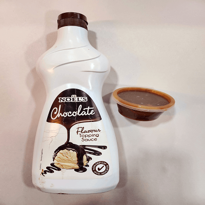 Tub Of Chocolate Sauce 